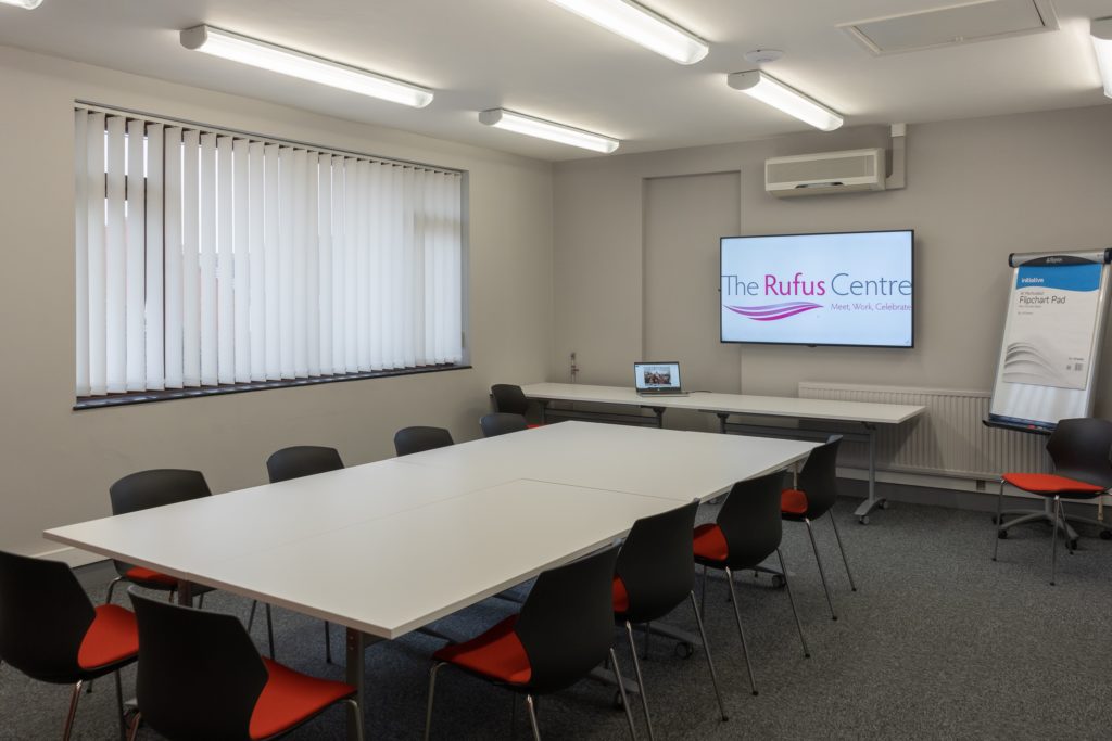 Meeting room orange chairs